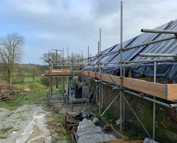 The old barns already had scaffolding, however, it was poor quality, so we dismantled them and erected our own scaffolding.